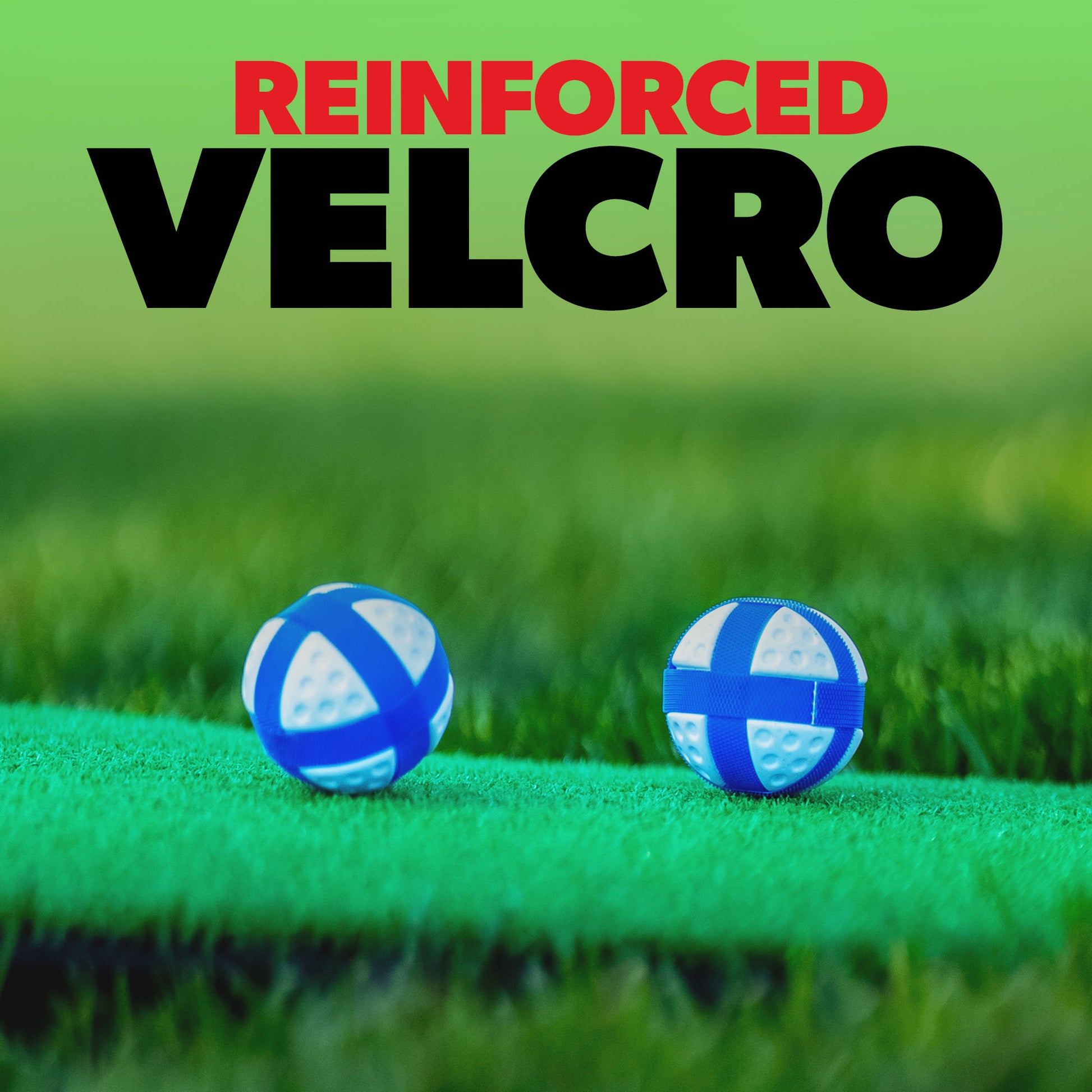 Two blue and white striped Golf Pong balls on grass with 'Reinforced VELCRO' text above.