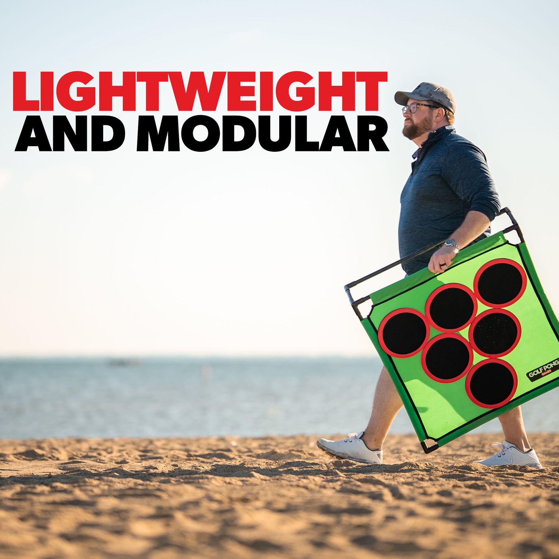Man carrying a green and black modular Golf Pong game set on a beach with text 'Lightweight and Modular'.