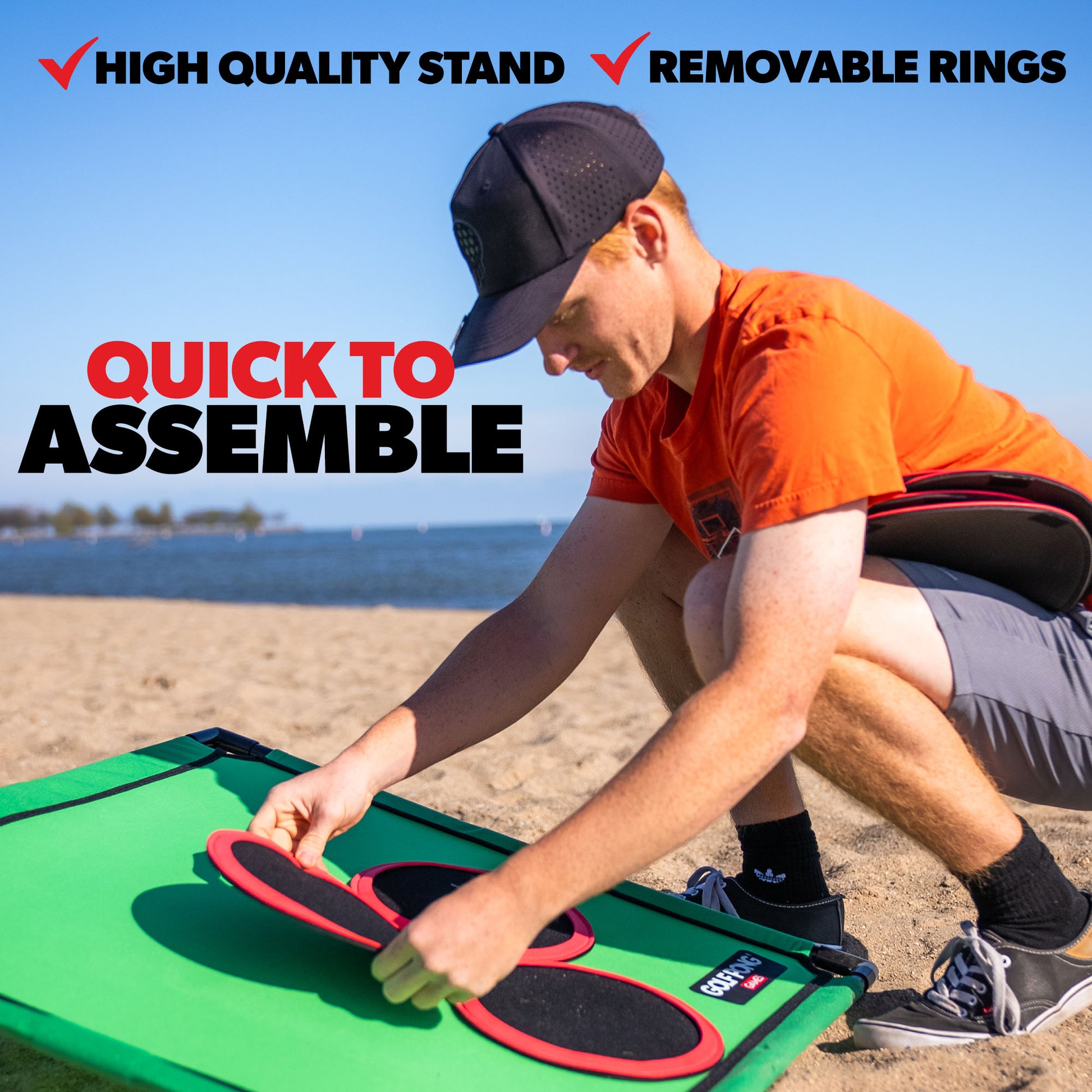 Person assembling a green and red Golf Pong stand on a beach with text highlighting features.